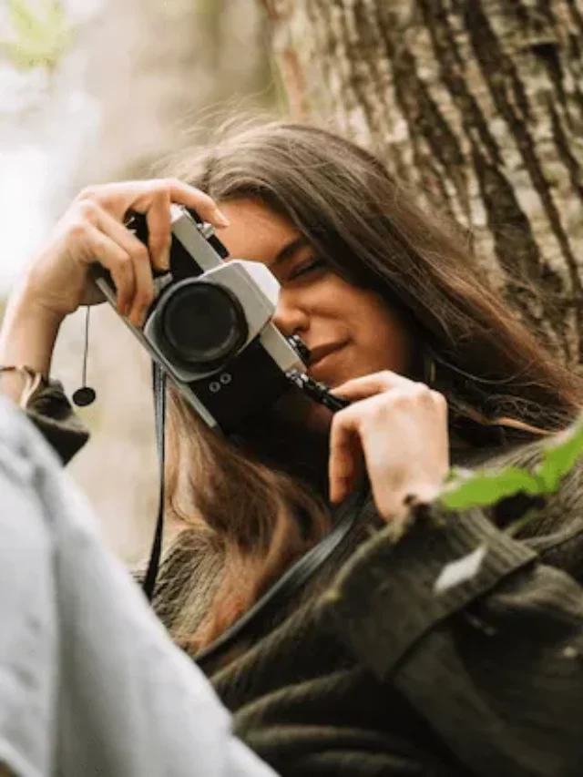 young-woman-taking-photo-nature_23-2148192732