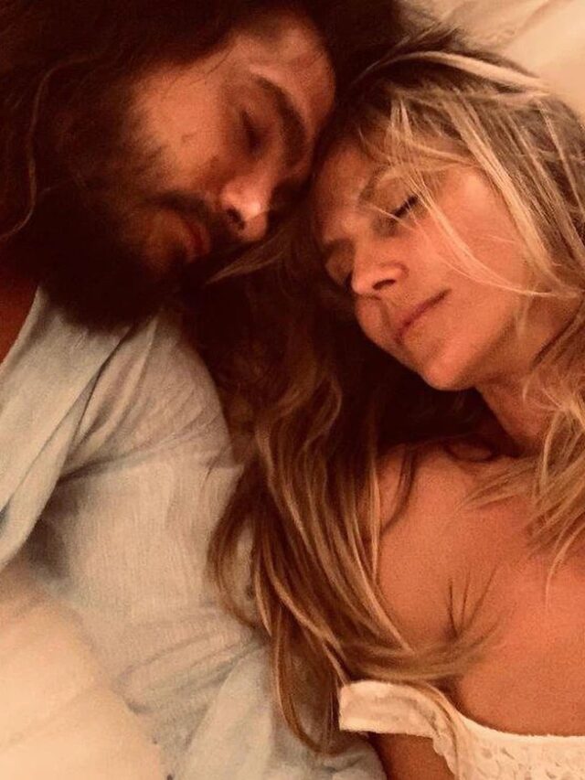 Heidi Klum and her sleeping husband Tom Kaulitz are seen cuddling up in holiday pajamas.